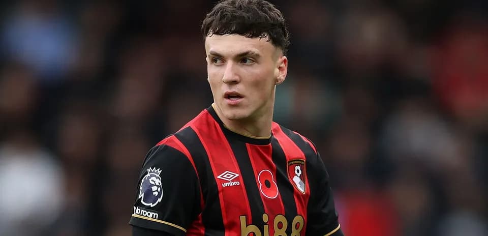 Bournemouth player during match in black and red kit