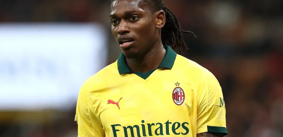 Player in AC Milan jersey during match