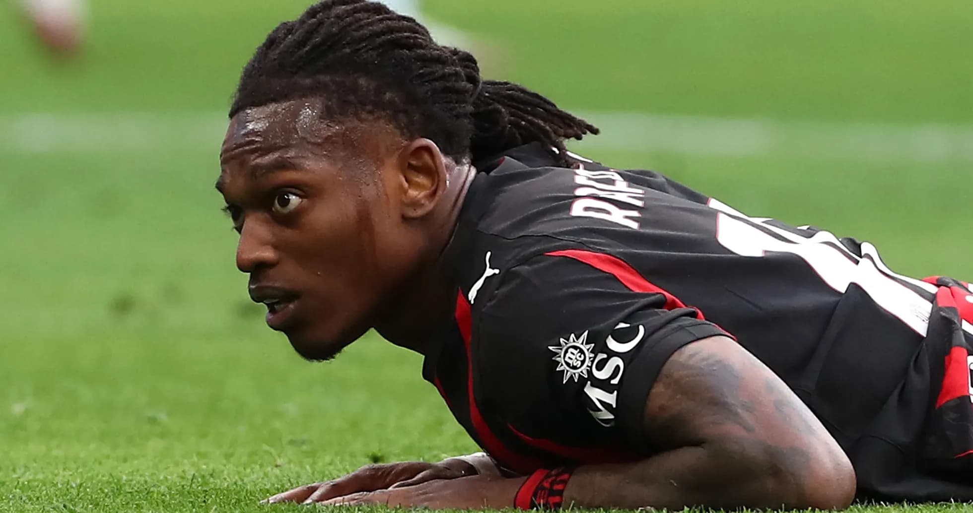 Player lying on the pitch during a match