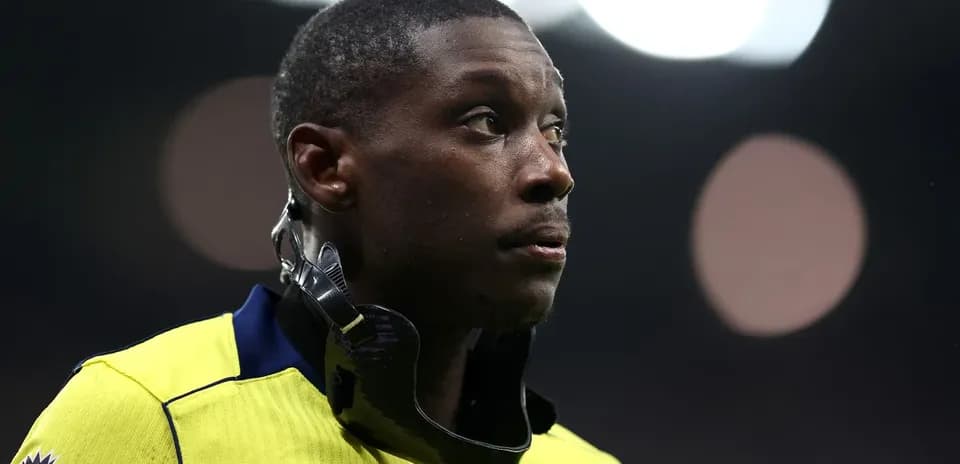 Player wearing neck brace on the pitch