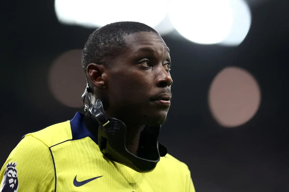 Player wearing neck brace on the pitch