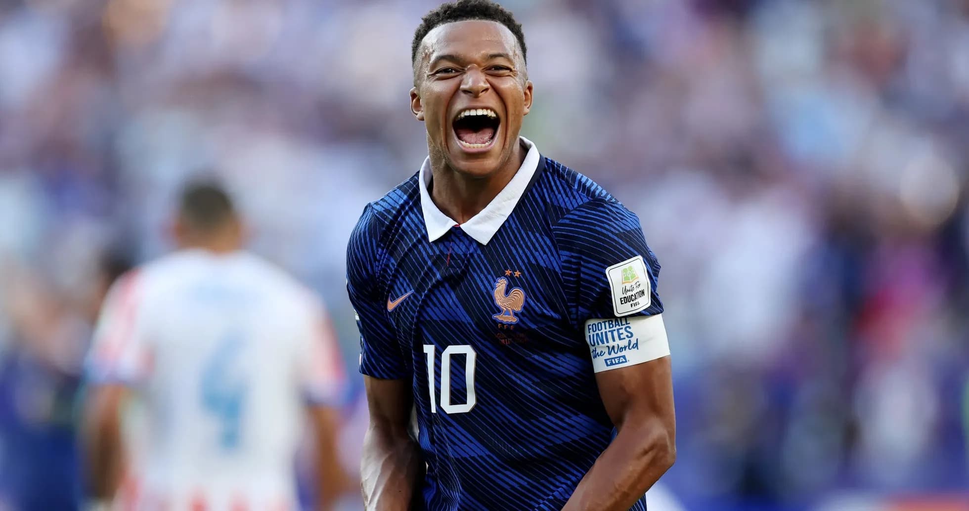 Player celebrating during match wearing France jersey