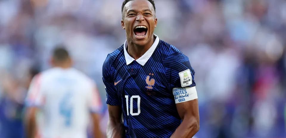 Player celebrating during match wearing France jersey