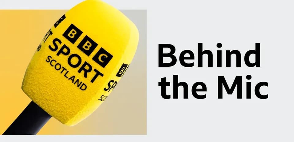 Yellow BBC Sport microphone on grey background
