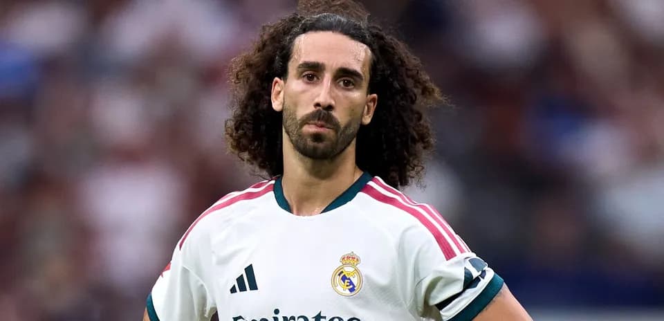 Player in Real Madrid kit on the pitch
