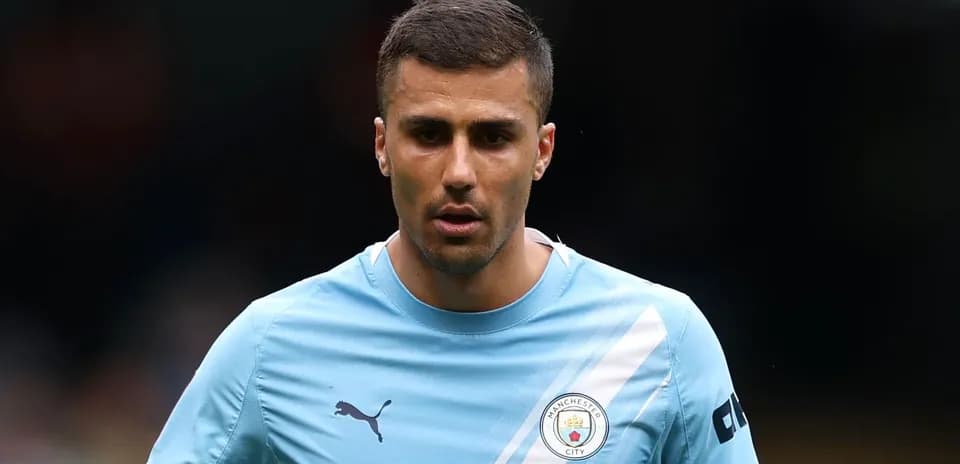 Player wearing Manchester City kit on the field