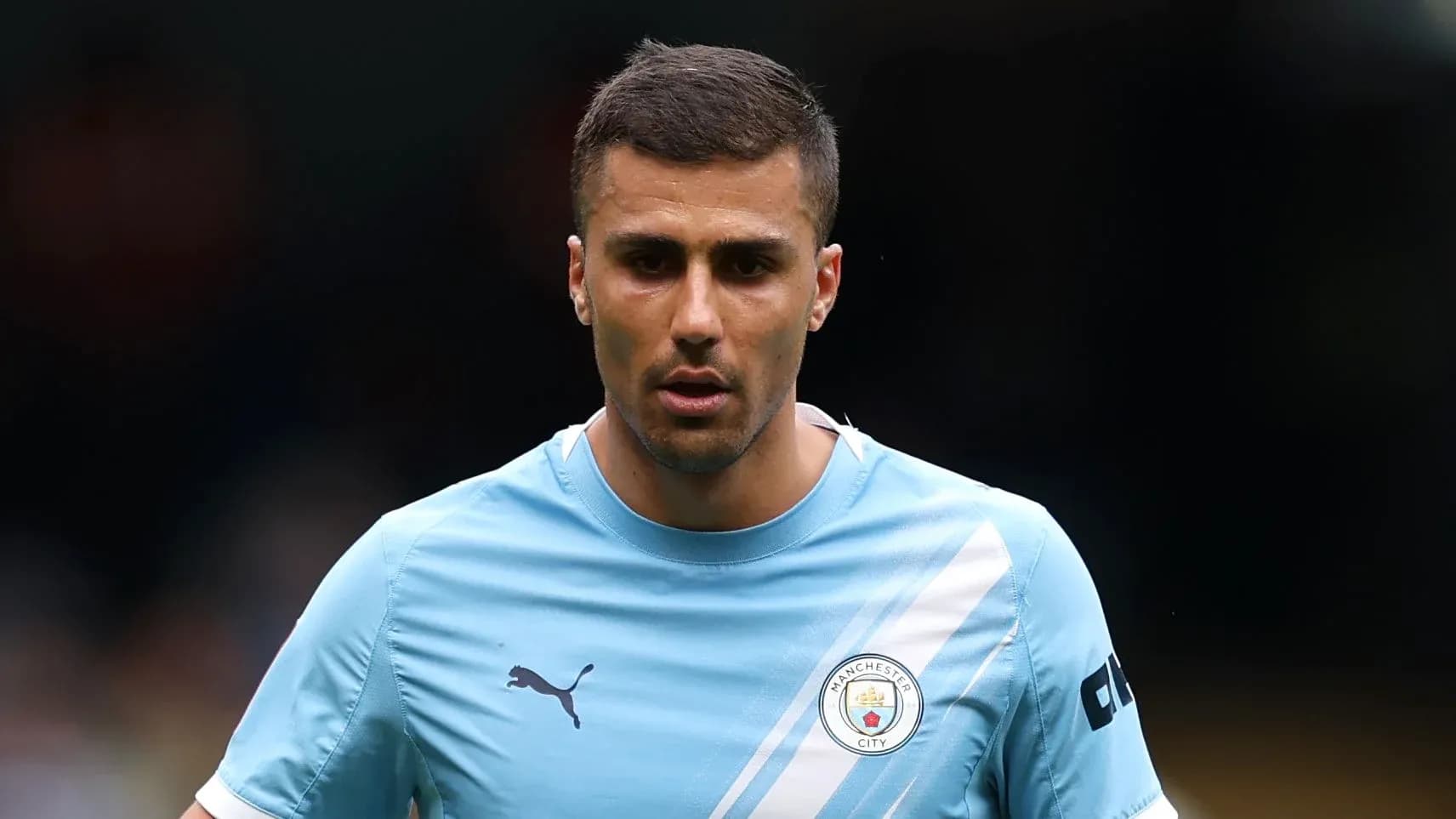 Player wearing Manchester City kit on the field