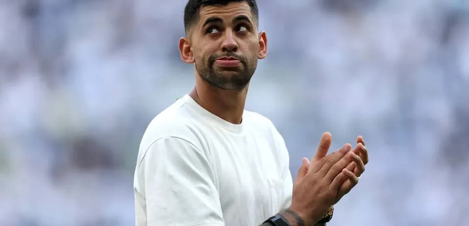 Player applauding during match warm-up on field