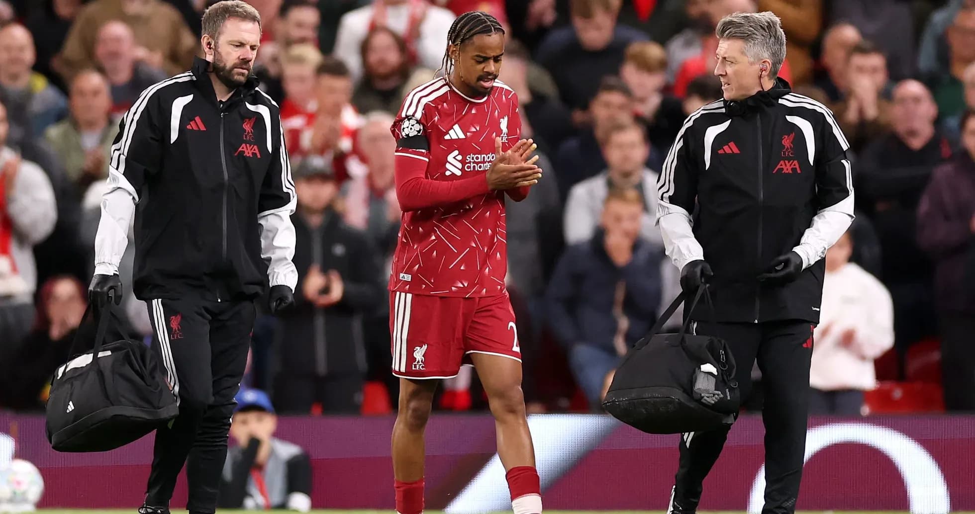 Player leaving field with medical staff during match