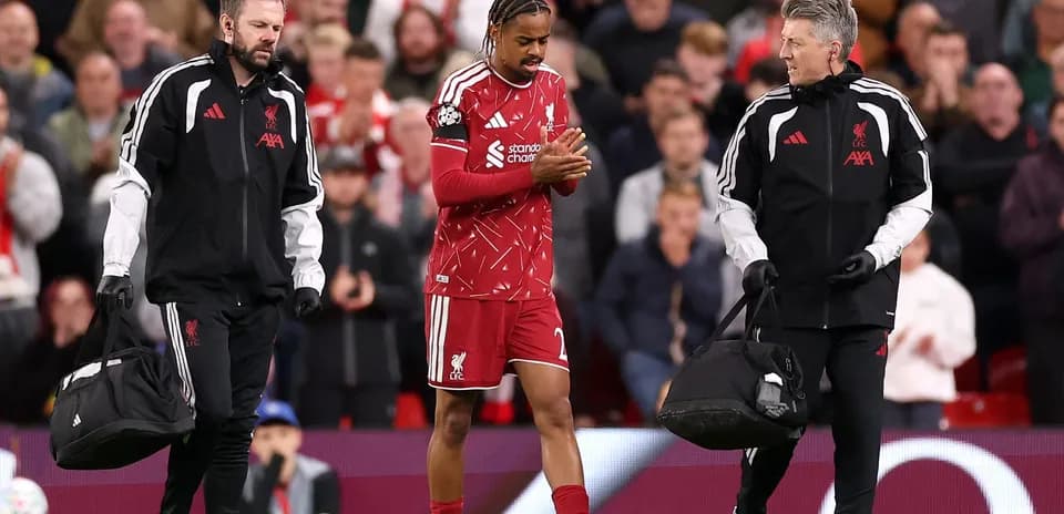 Player leaving field with medical staff during match