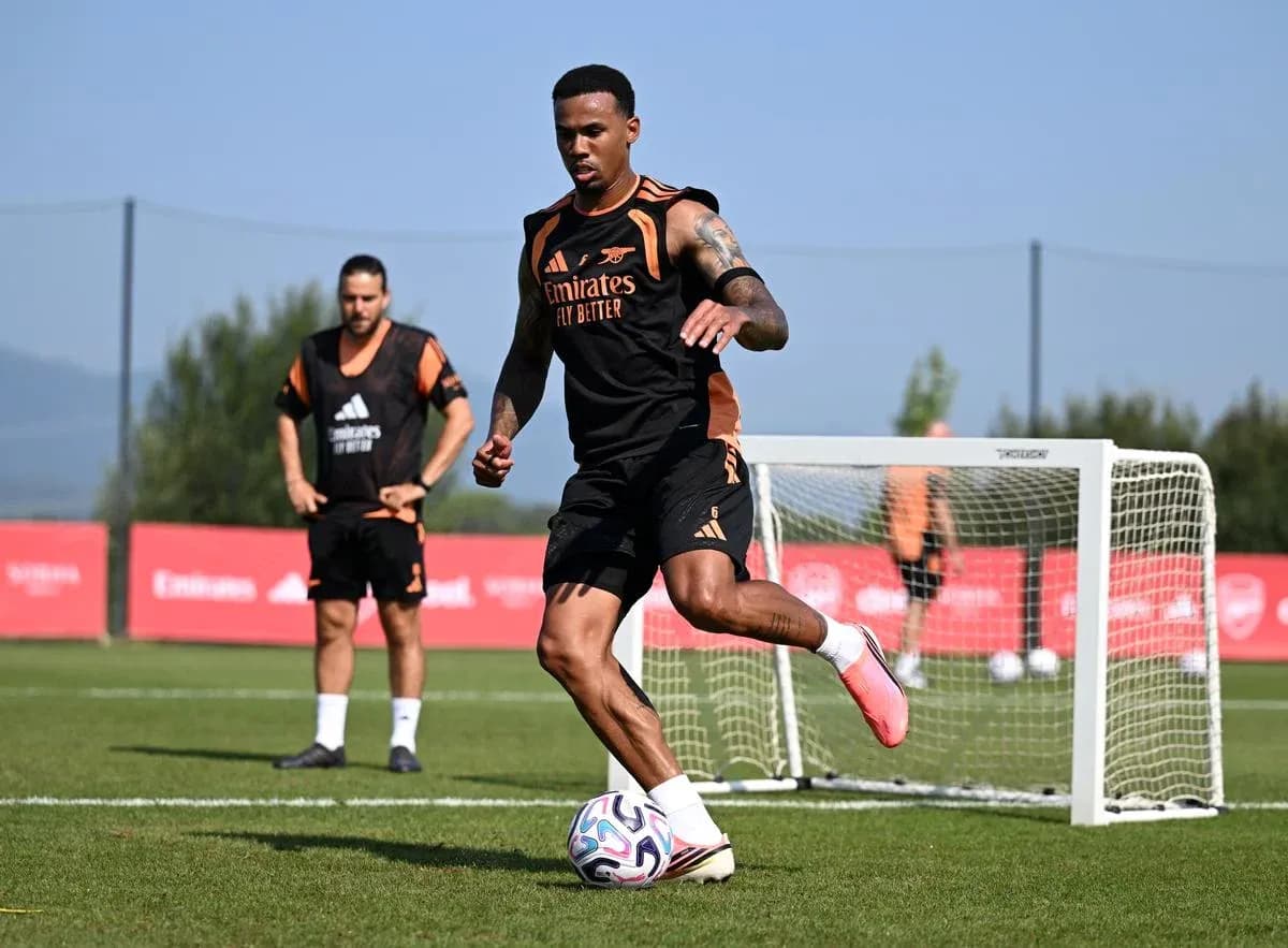 Player dribbling football during training session
