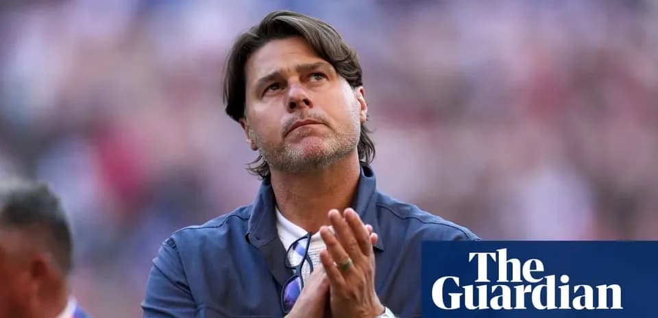 Coach with hands clasped, looking upwards