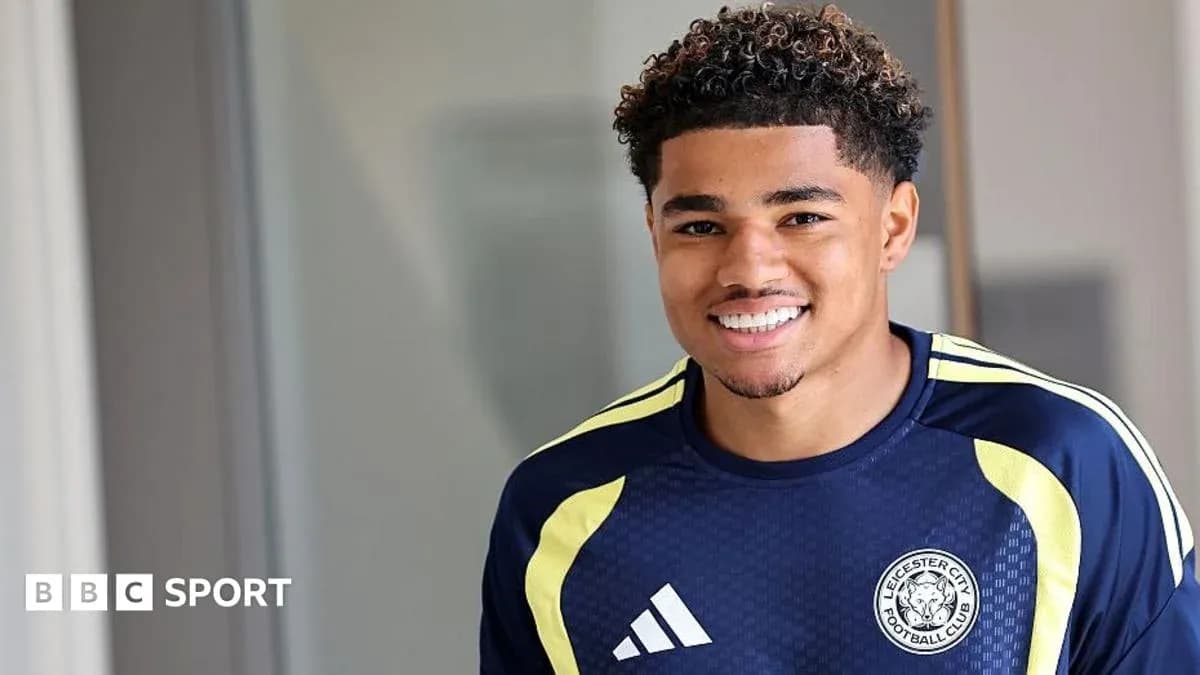 Player smiling in Leicester City training kit