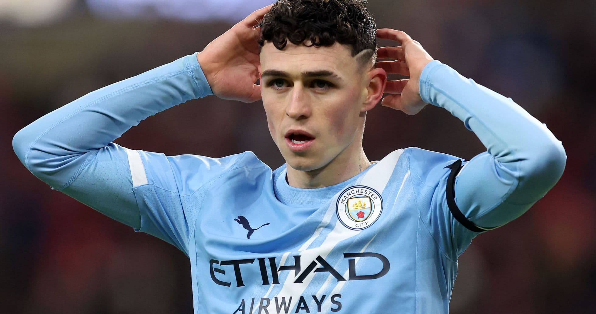 Phil Foden with hands on head during match
