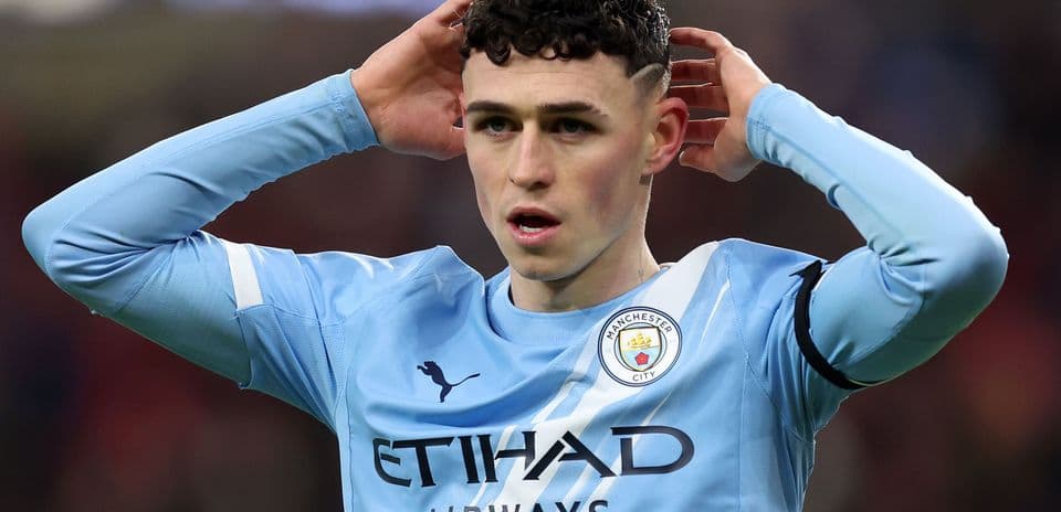 Phil Foden with hands on head during match