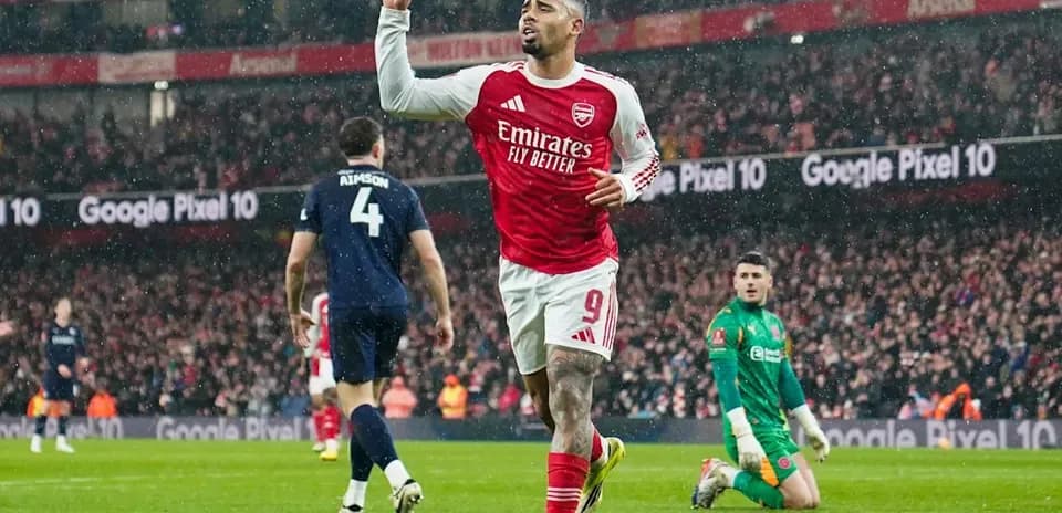 Arsenal player celebrating after scoring a goal