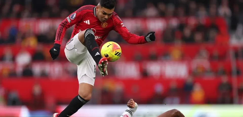 Casemiro in action against Fulham player