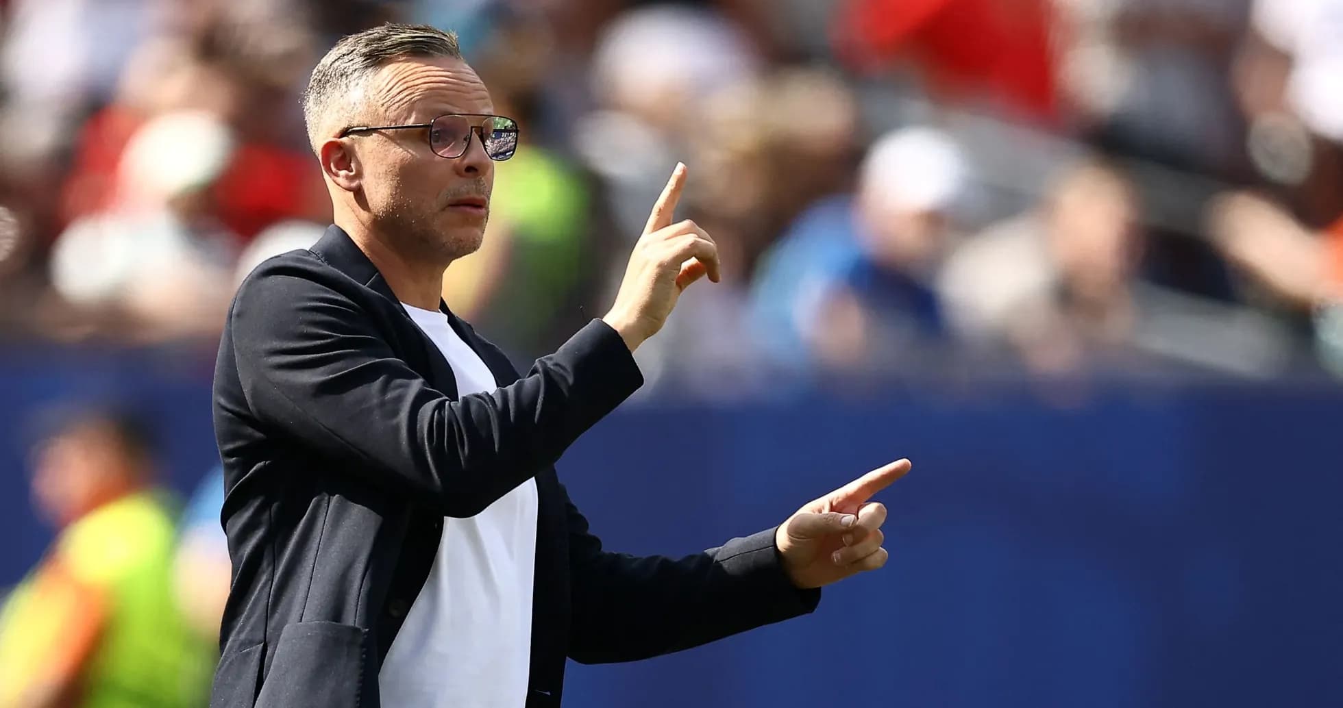 Coach giving instructions during a match
