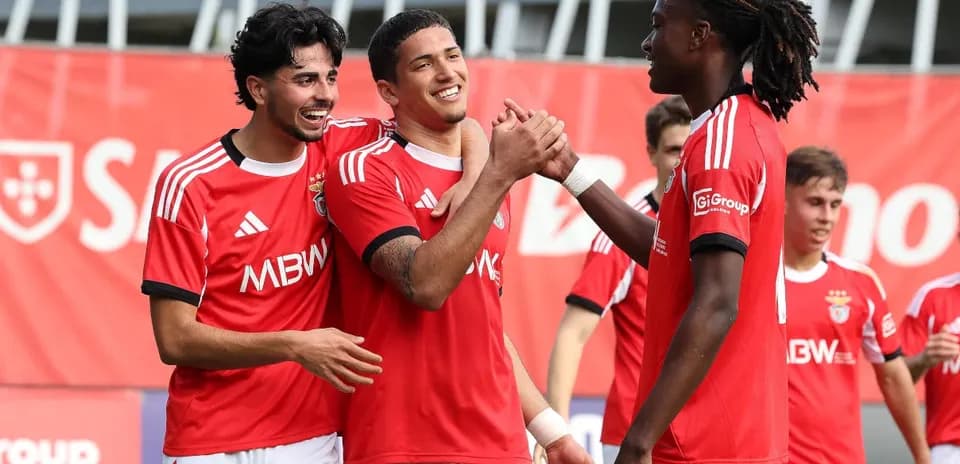 Benfica players celebrating a goal together