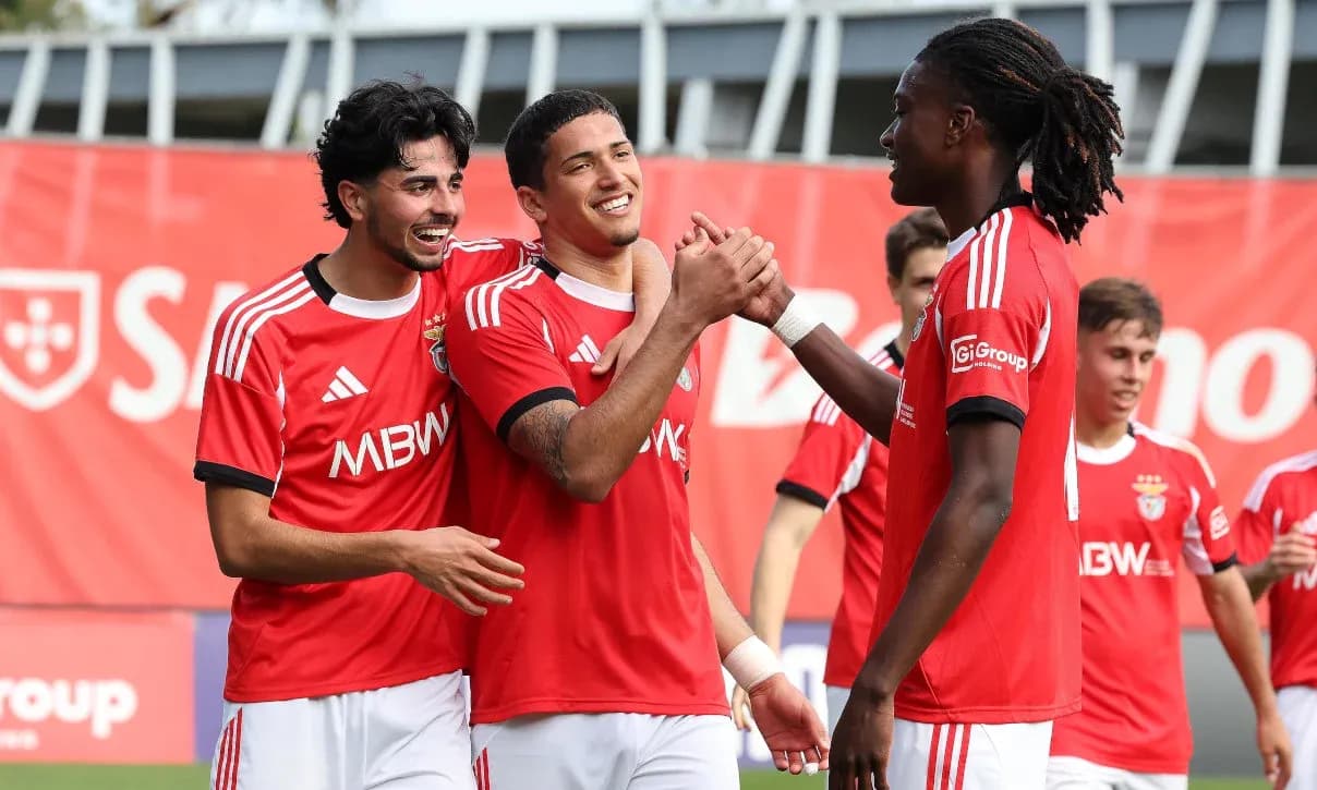 Benfica players celebrating a goal together