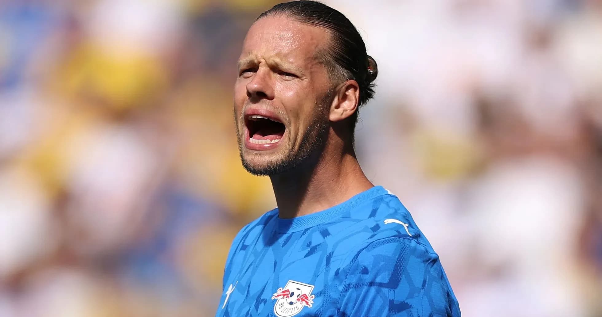 Goalkeeper shouting during a football match