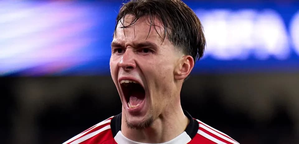 Player celebrating passionately after scoring a goal