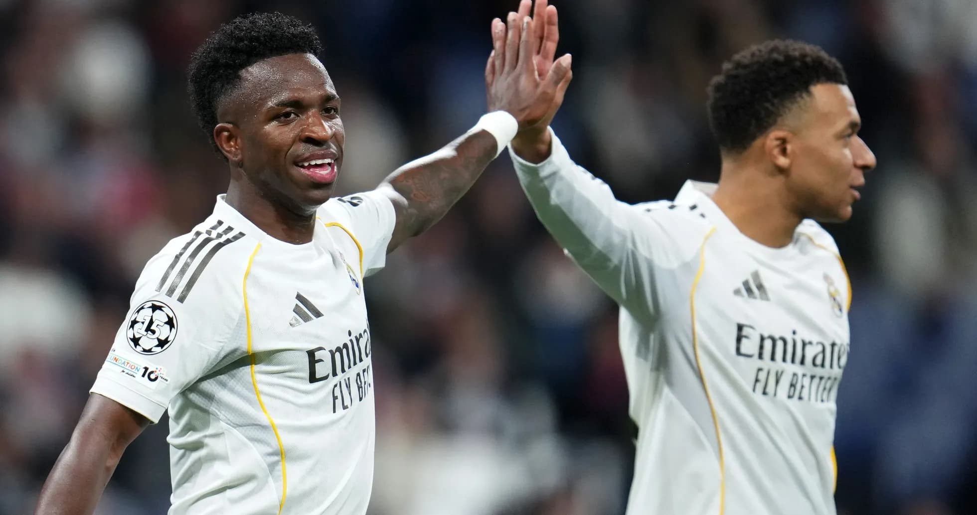 Vinícius Júnior and Mbappé celebrating a goal