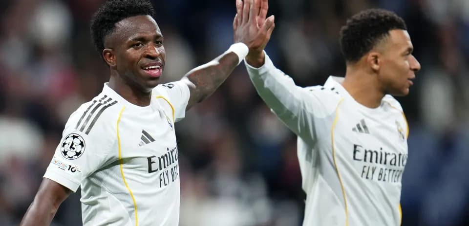 Vinícius Júnior and Mbappé celebrating a goal