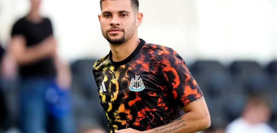 Player in colorful training kit before match