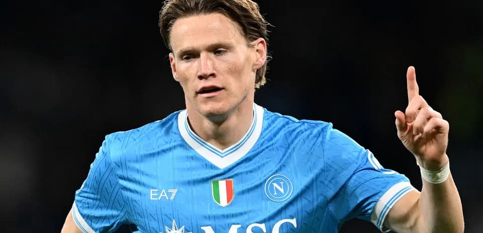 Player celebrating in Napoli's blue jersey during match