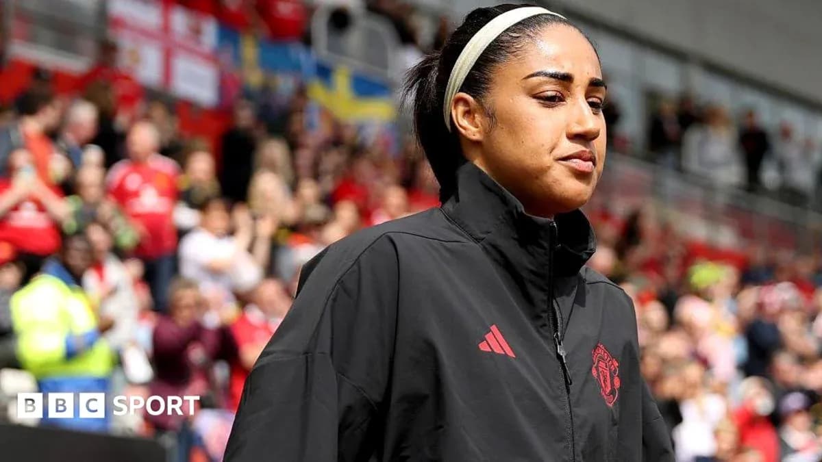 Player walking onto the pitch before match