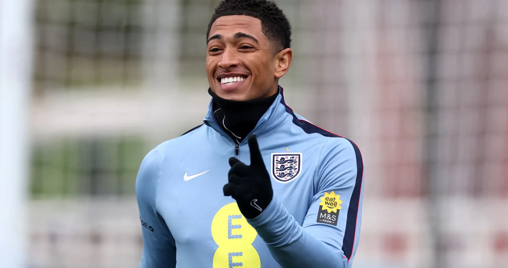 Player smiling and gesturing during training session