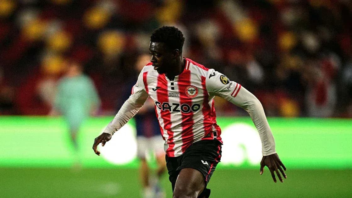 Brentford player running during a match