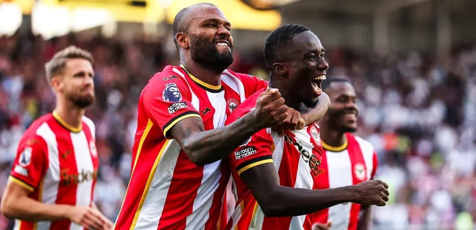 Brentford players celebrating a goal together