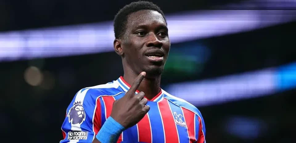 Player celebrating and pointing during match