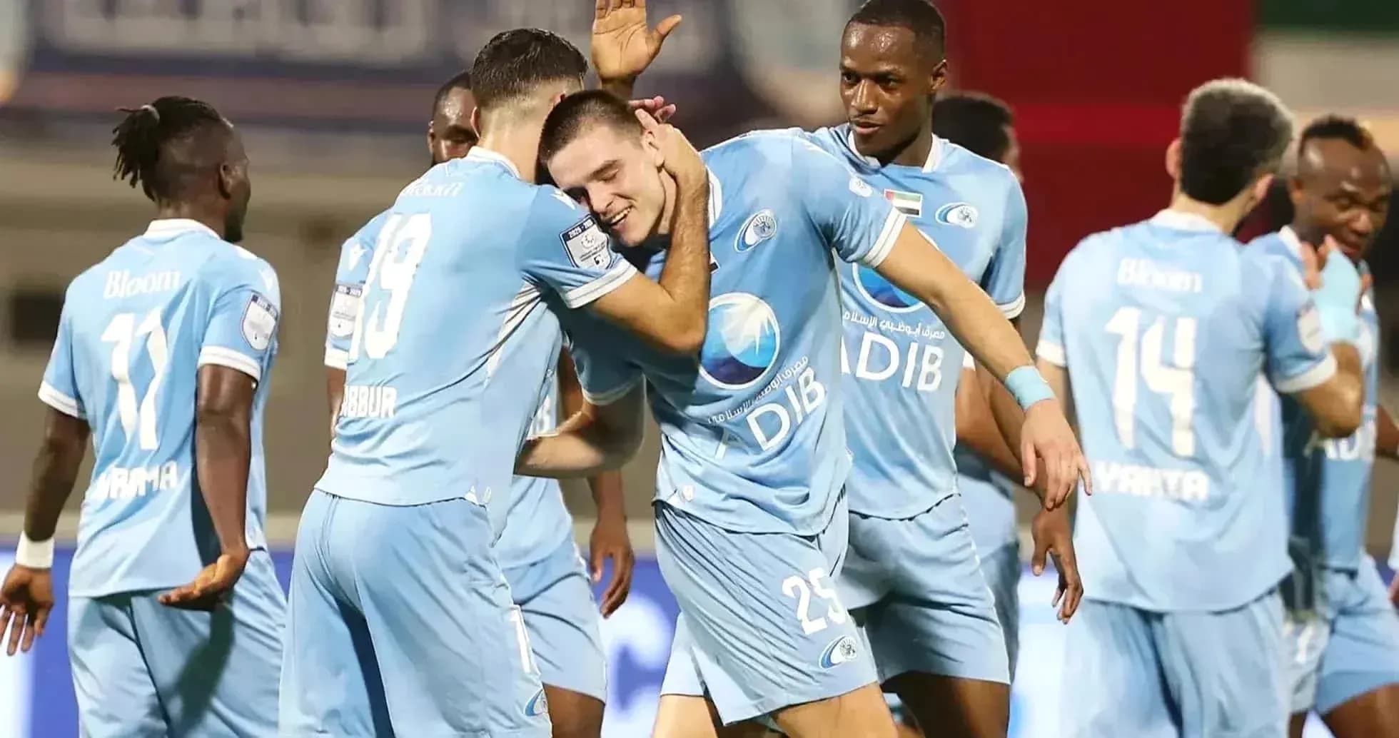 Players celebrating a goal during U23 football match