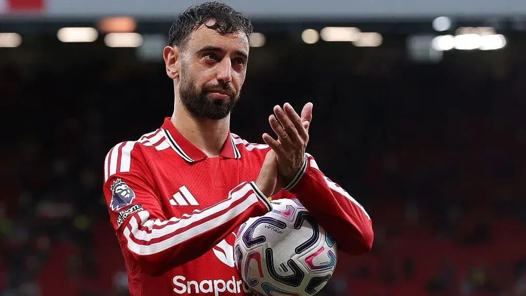 Bruno Fernandes applauding fans at Old Trafford