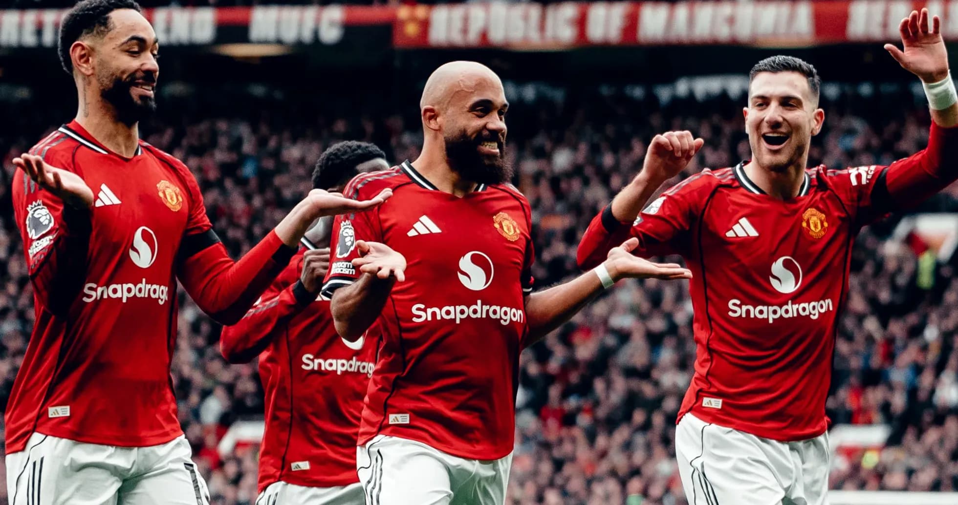 Manchester United players celebrating a goal