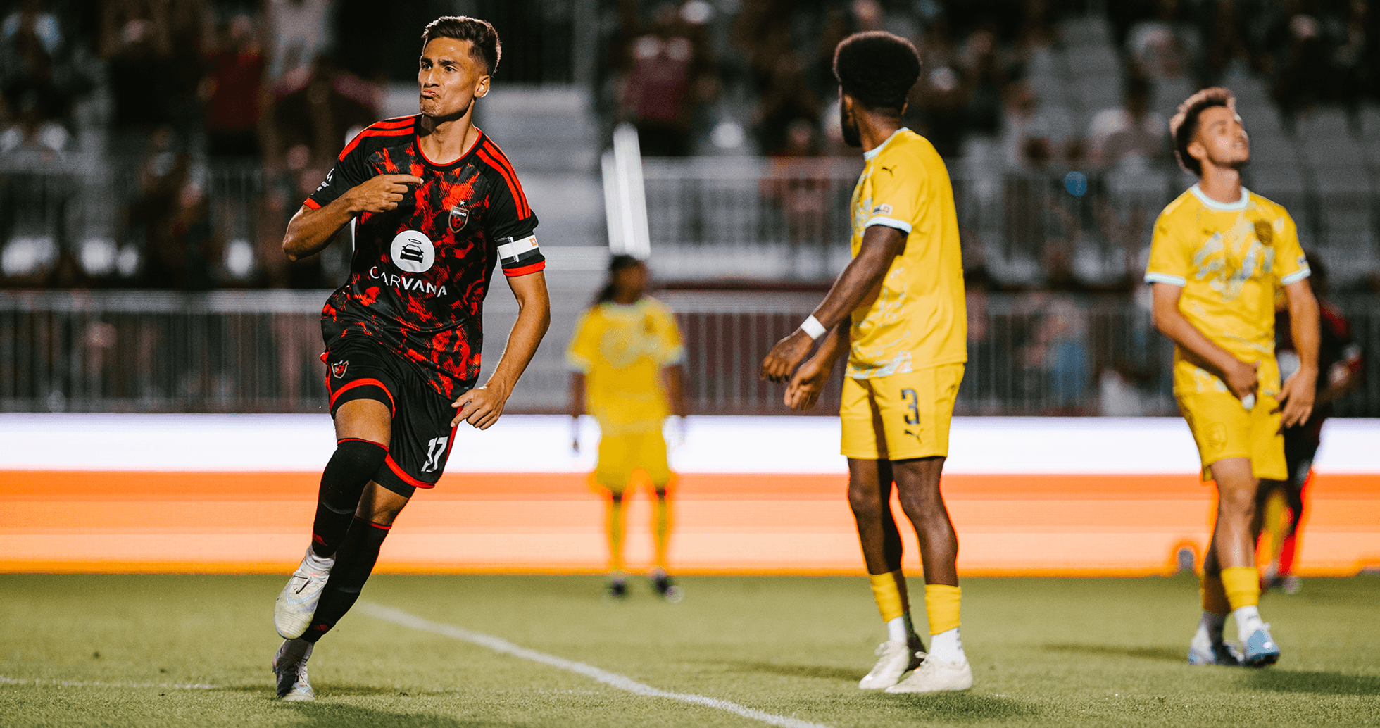 New Mexico United player celebrating a goal