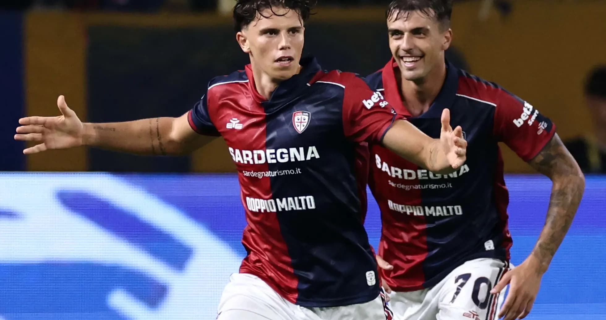 Cagliari players celebrating a goal during match