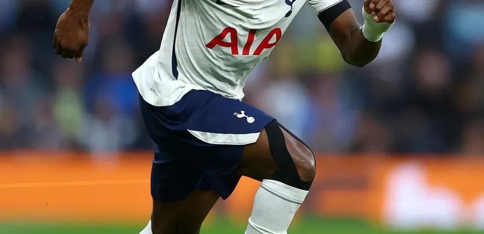Player sprinting with ball during match