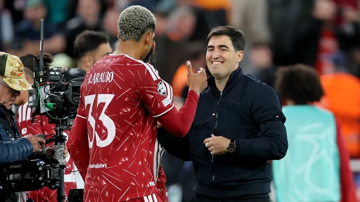 Player and coach interacting during match warm-up