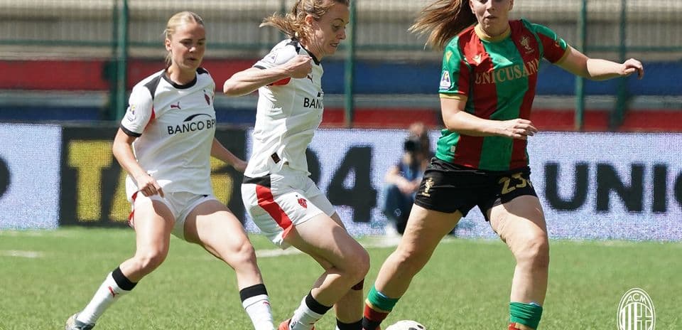 Players competing for the ball during Serie A match
