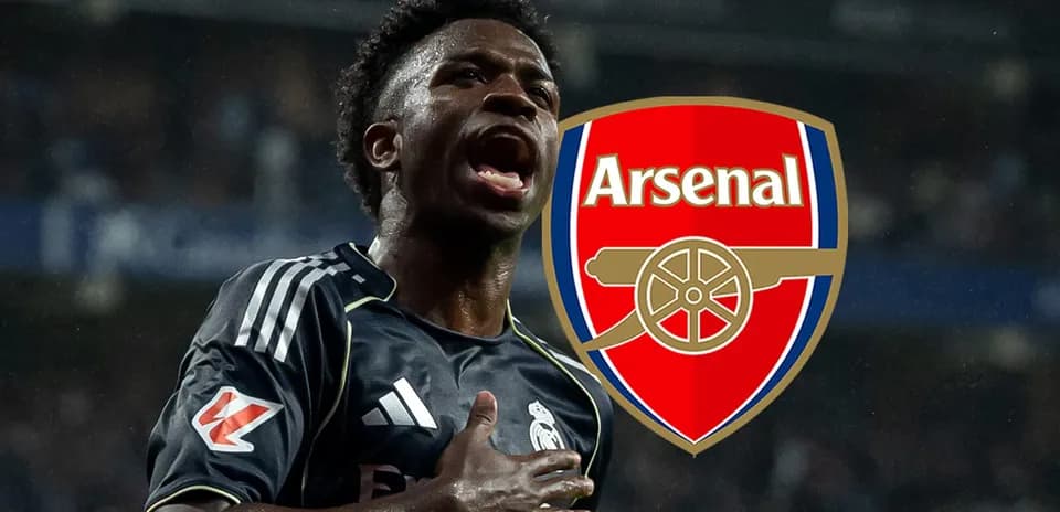 Player celebrating a goal with Arsenal logo in background