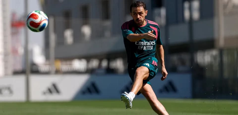 Player kicking a soccer ball during training session