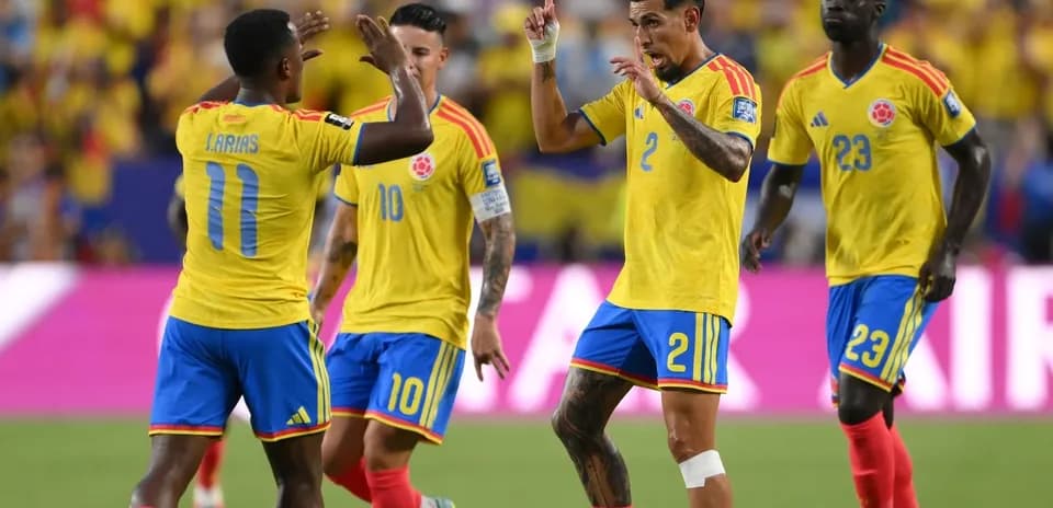 Colombian players celebrating a goal on the field