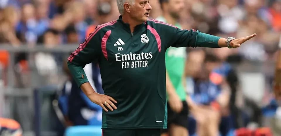 Coach gesturing during match on the sidelines