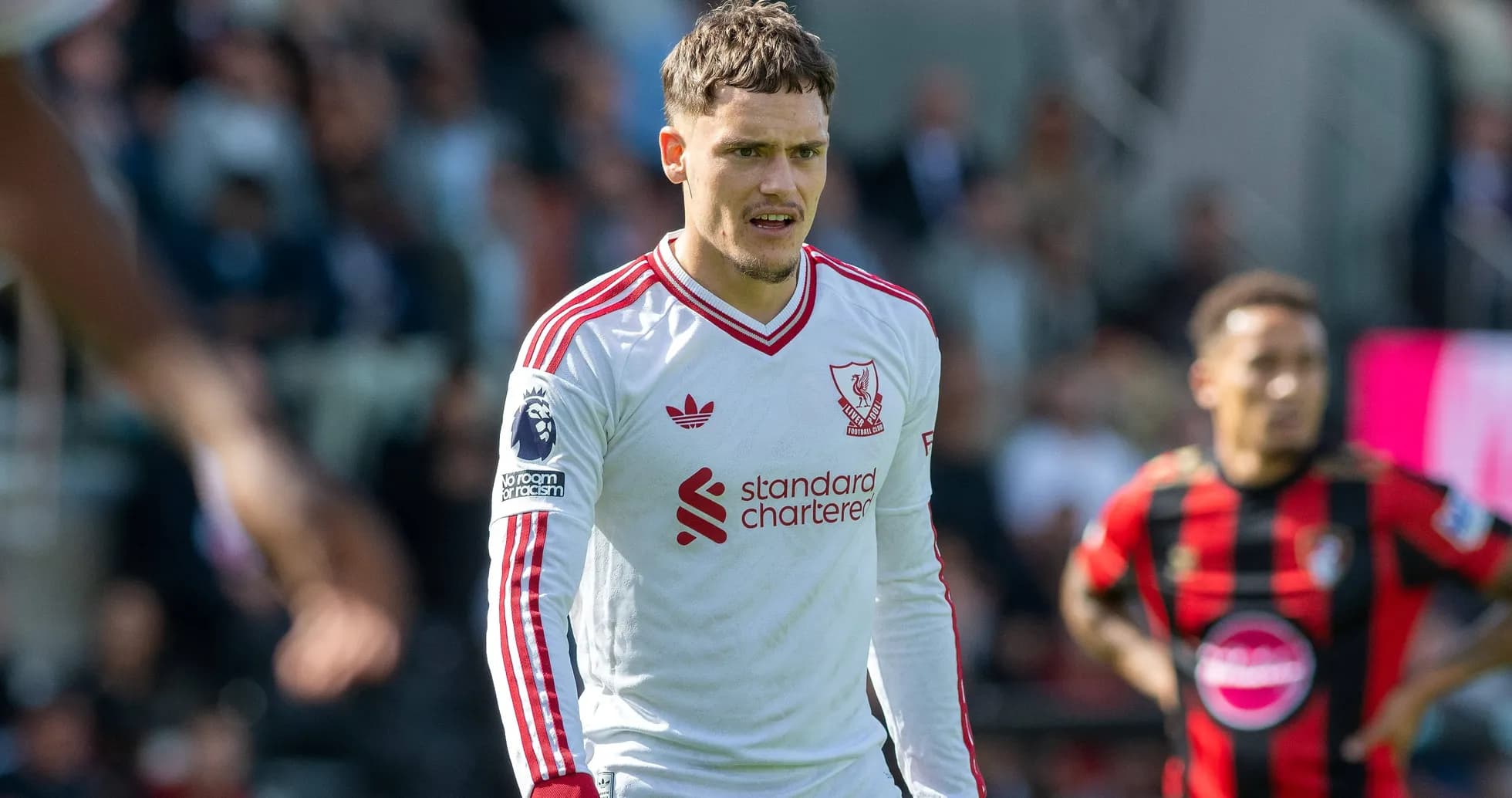 Liverpool player on pitch during match action