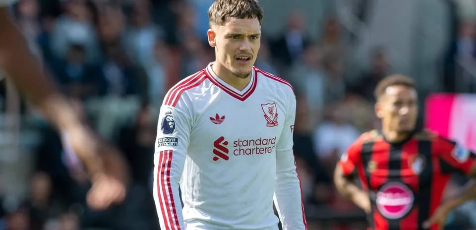 Liverpool player on pitch during match action