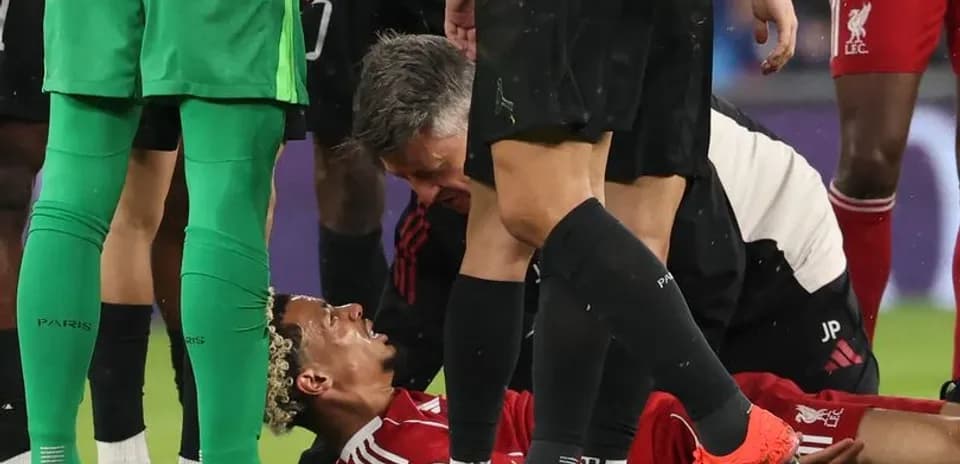 Player receiving medical attention on the pitch